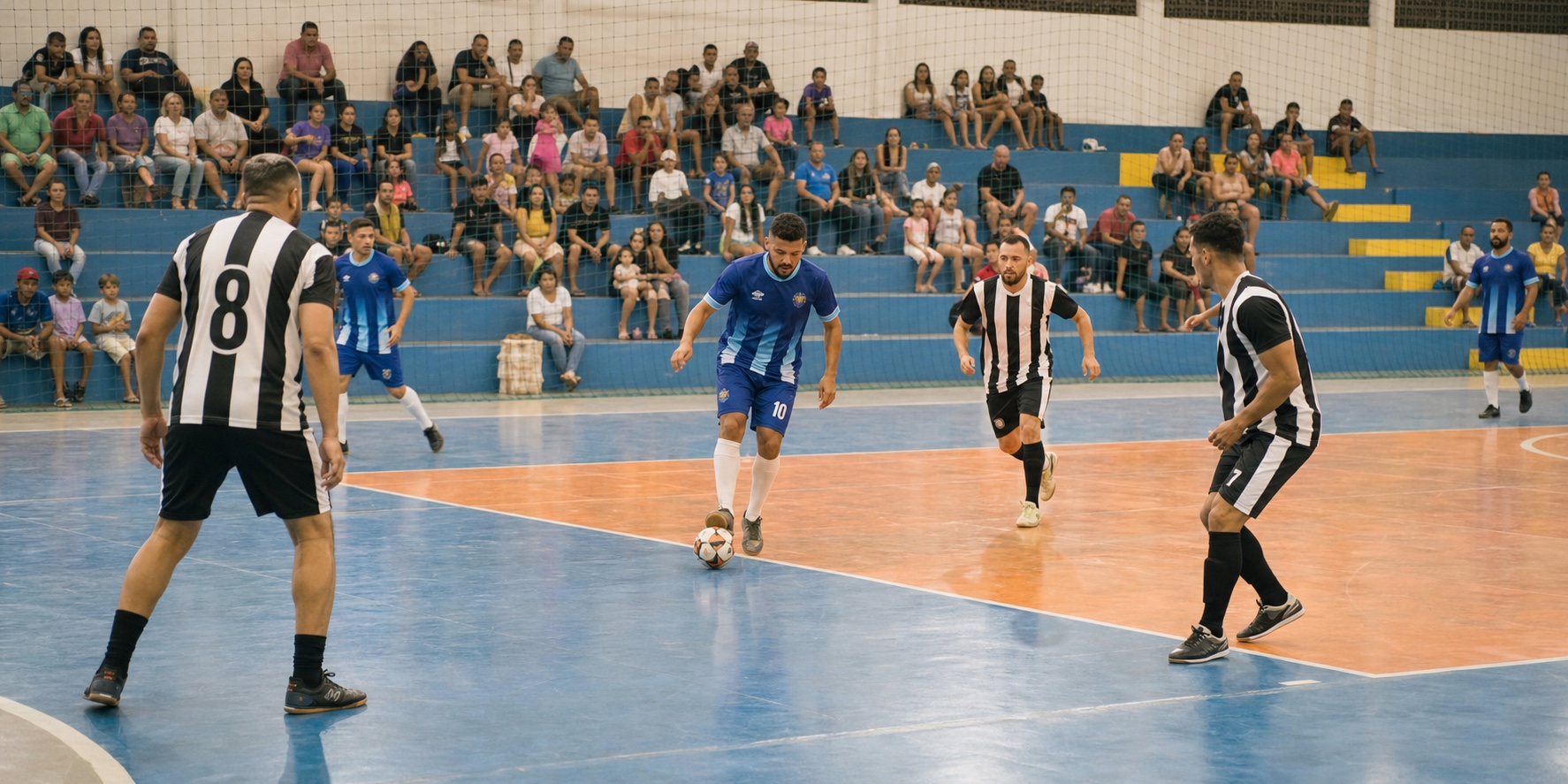 Partida de futsal com atletas e famílias acompanhando a Copa IGO em Avaré